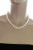 Ожерелье из белого рисообразного речного жемчуга. Жемчужины 7,5-8 мм