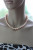 Ожерелье из круглого речного розового жемчуга. Жемчужины 10,5-11,5 мм